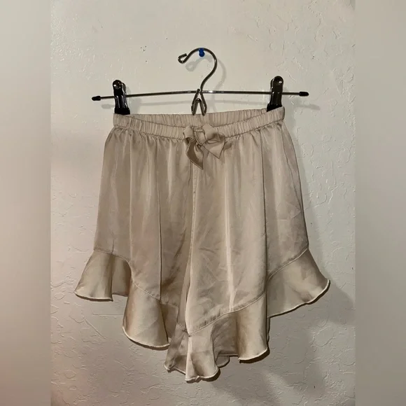 Cream Ruffle Hem Shorts - Picture 1 of 3